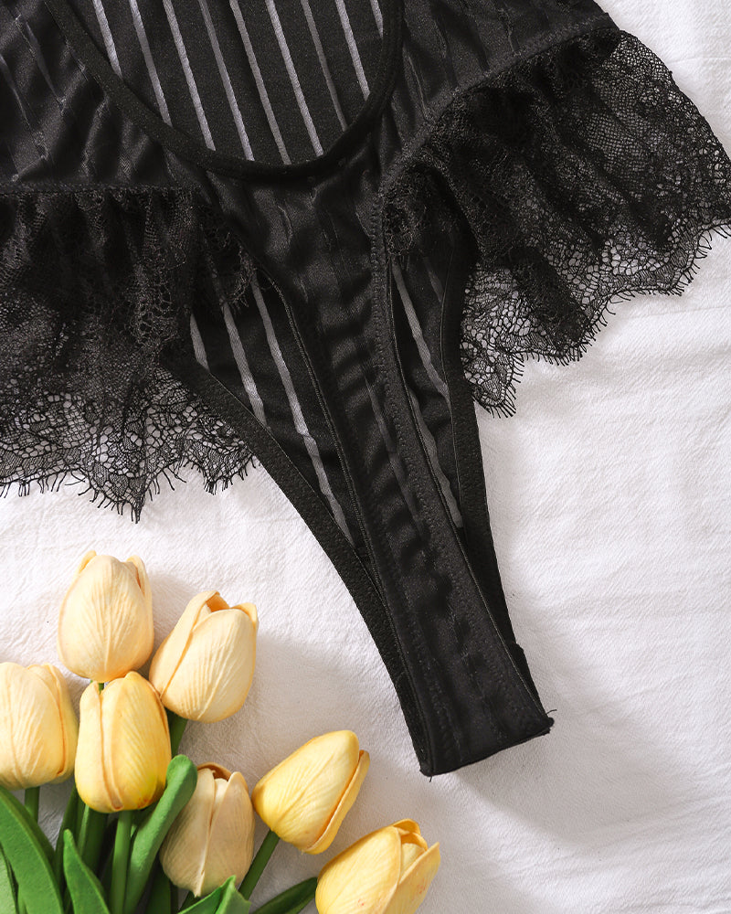 Black lace bodysuit with eyelash lace trim, vertical stripes and yellow tulips.