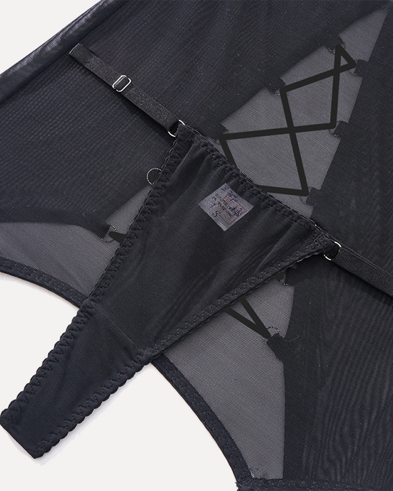 Black sheer lingerie set with thong and top. Sensual design with metal details.