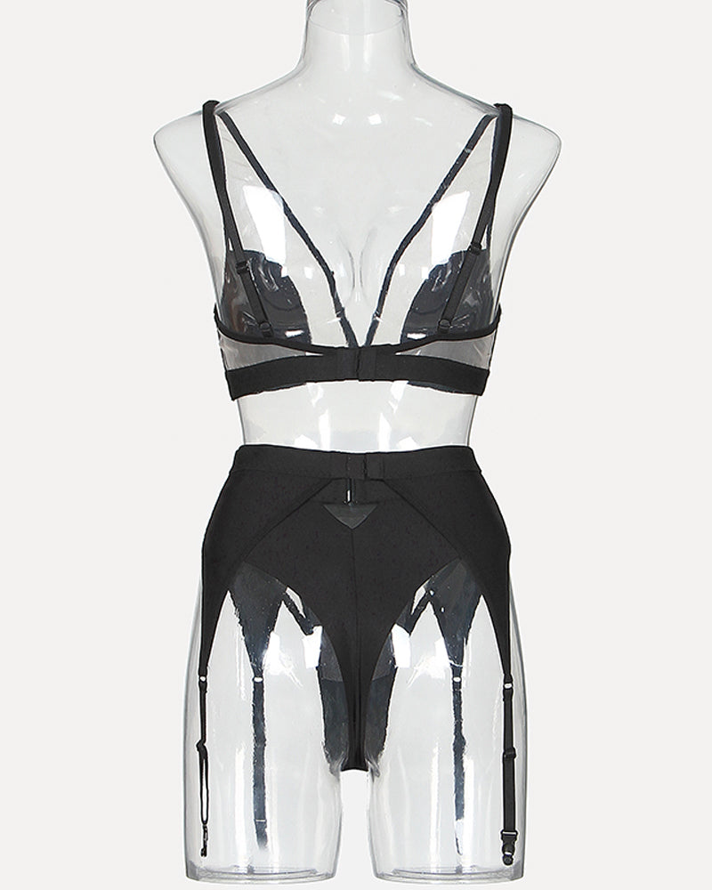 Black mesh lingerie set with adjustable straps and garter straps. Exotic lingerie.