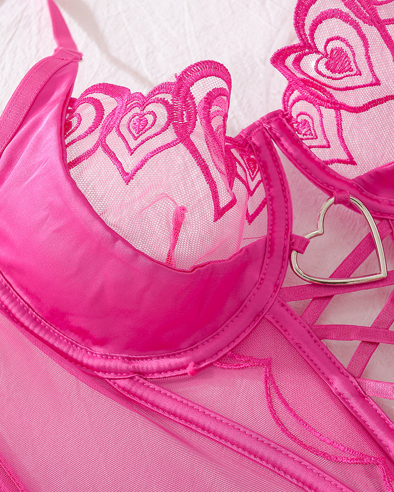 Magenta heart design bustier lingerie set with lace and metal details, perfect for a romantic look