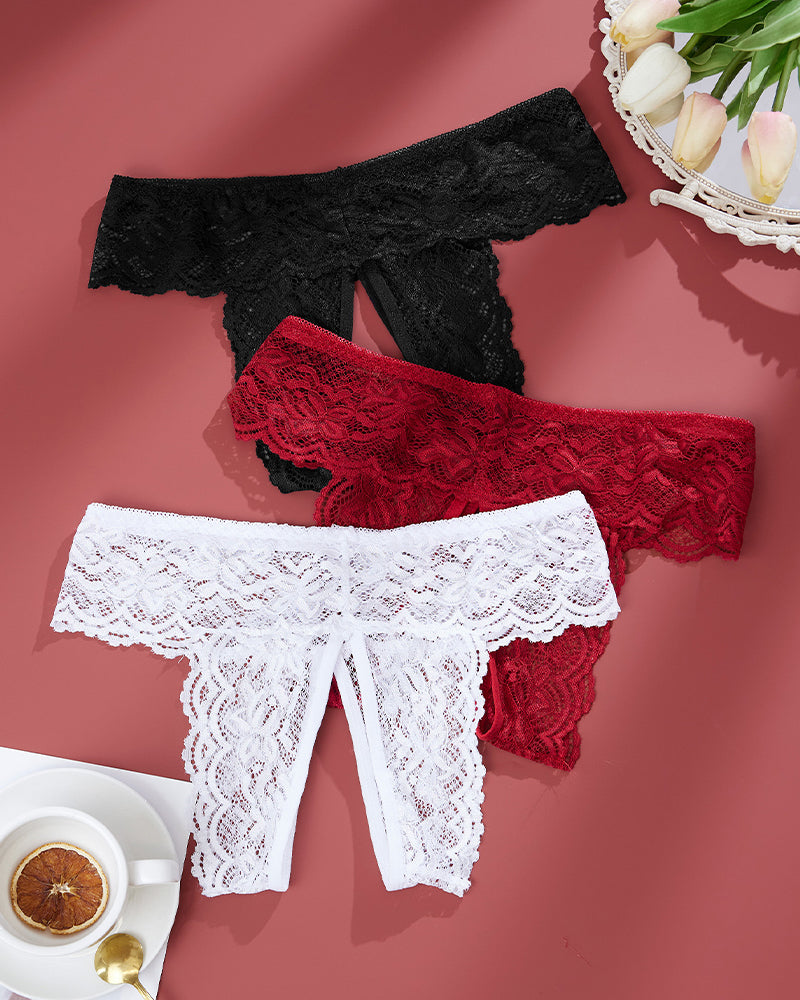 Plus size open crotch lace panties in black, red, and white. Romantic and sexy mid-rise briefs.