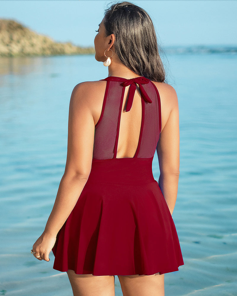 Burgundy plus size halter neck swim dress with skirted bottom and mesh back detail