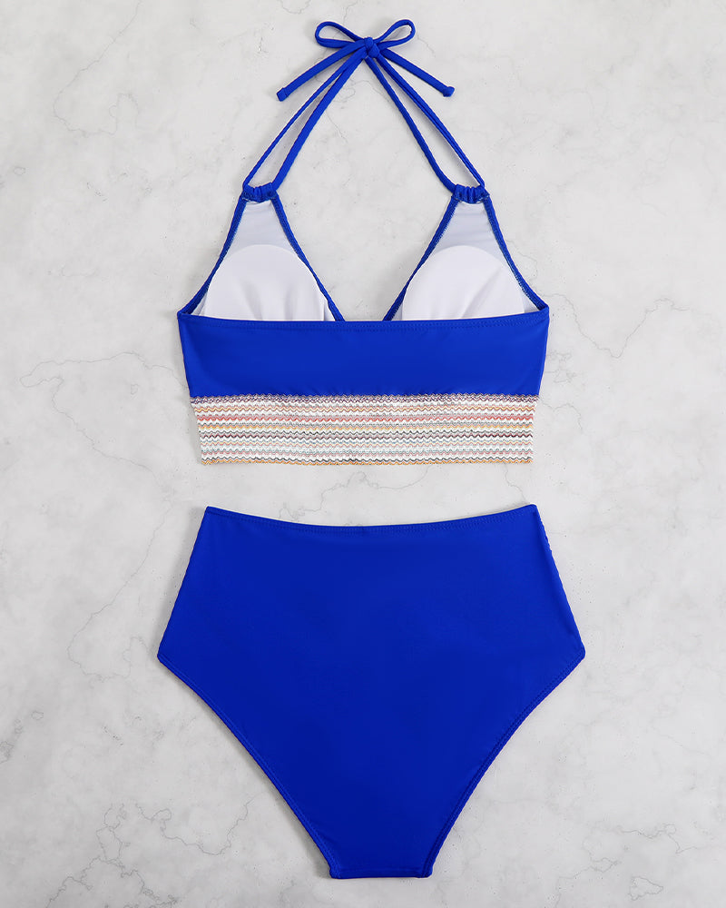 Blue color block bikini set with halter top and high-waisted bottoms, retro swimwear, beach styling
