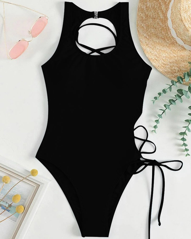 Black one-piece swimsuit with halter neck, keyhole back, and side ties, perfect for a sexy look.