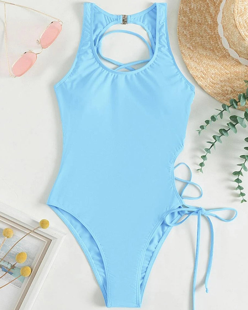 Light blue one-piece swimsuit with halter neck, open back, and side ties, perfect for a sexy look.