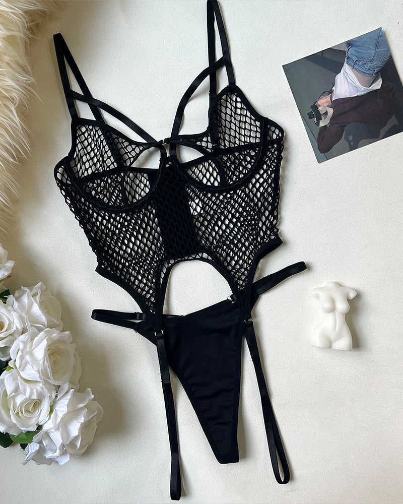 Black fishnet bodysuit, thong bottom, delicate fishnet details, designed for confidence and curves.