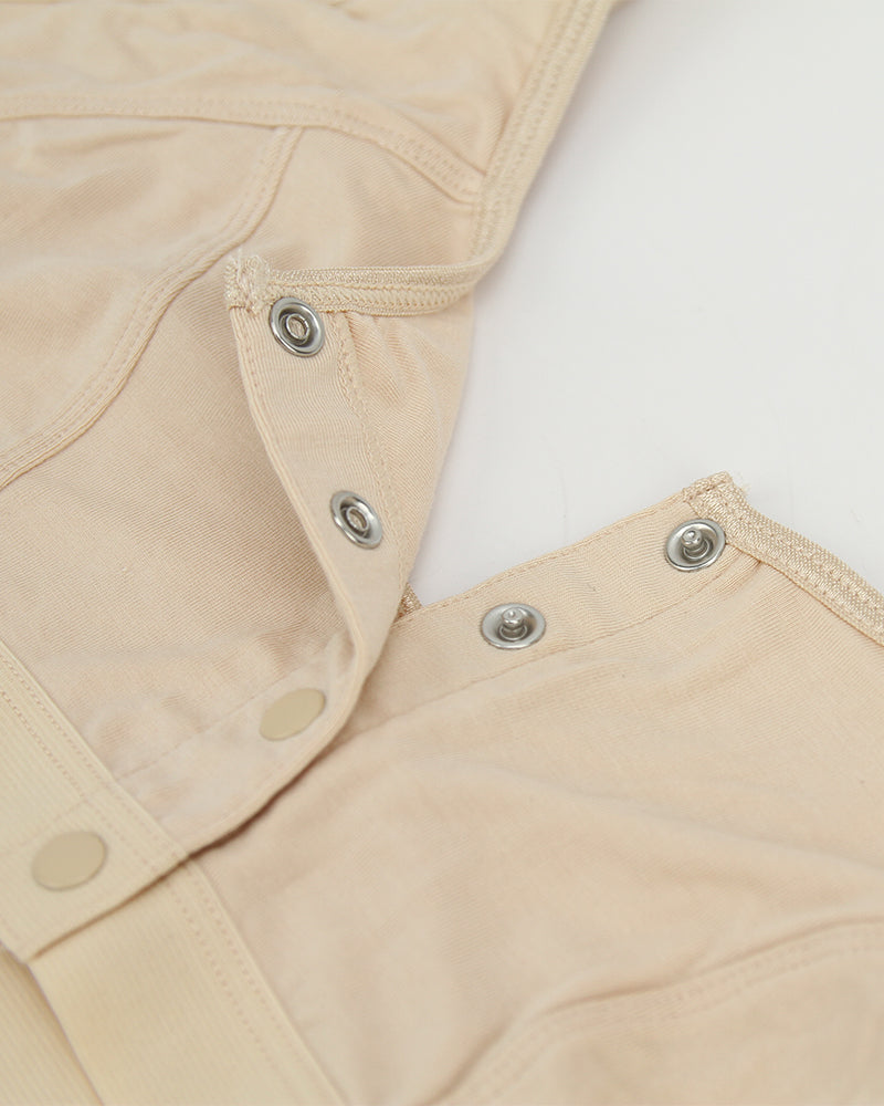 Front clasp non-wired bra in beige, full cup. Comfortable bamboo and spandex bra for women.