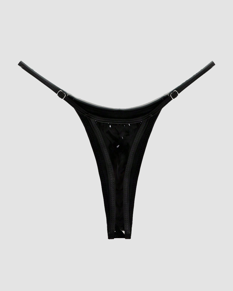 Black strappy leather thong with adjustable straps, perfect for special occasions. Comfortable fit.