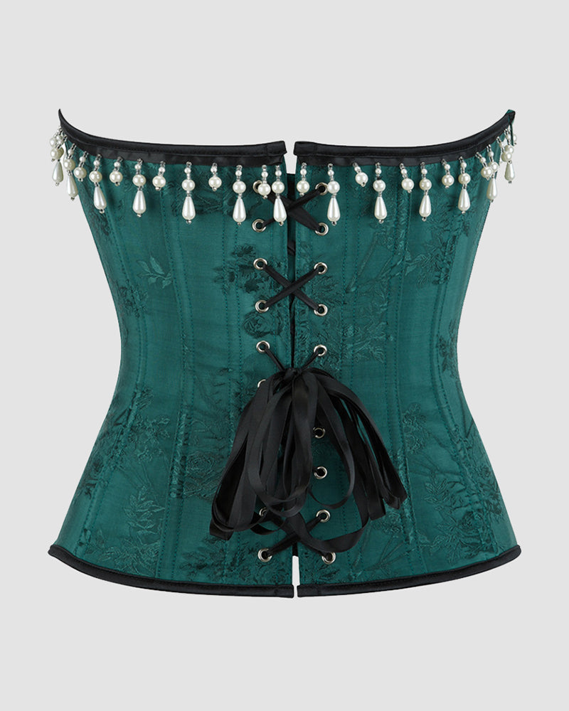 1980s Emerald green corset with pearl beading and waist training design