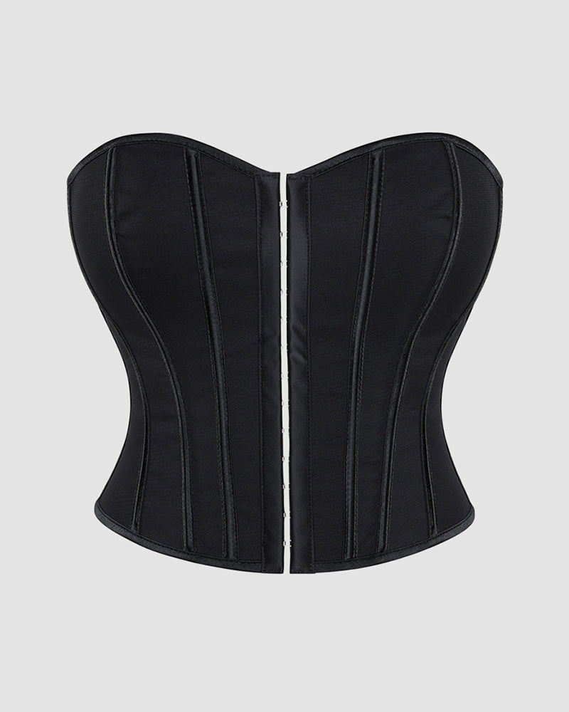 1960s black corset with boning. Designed for waist and abdomen support. Perfect for special events.