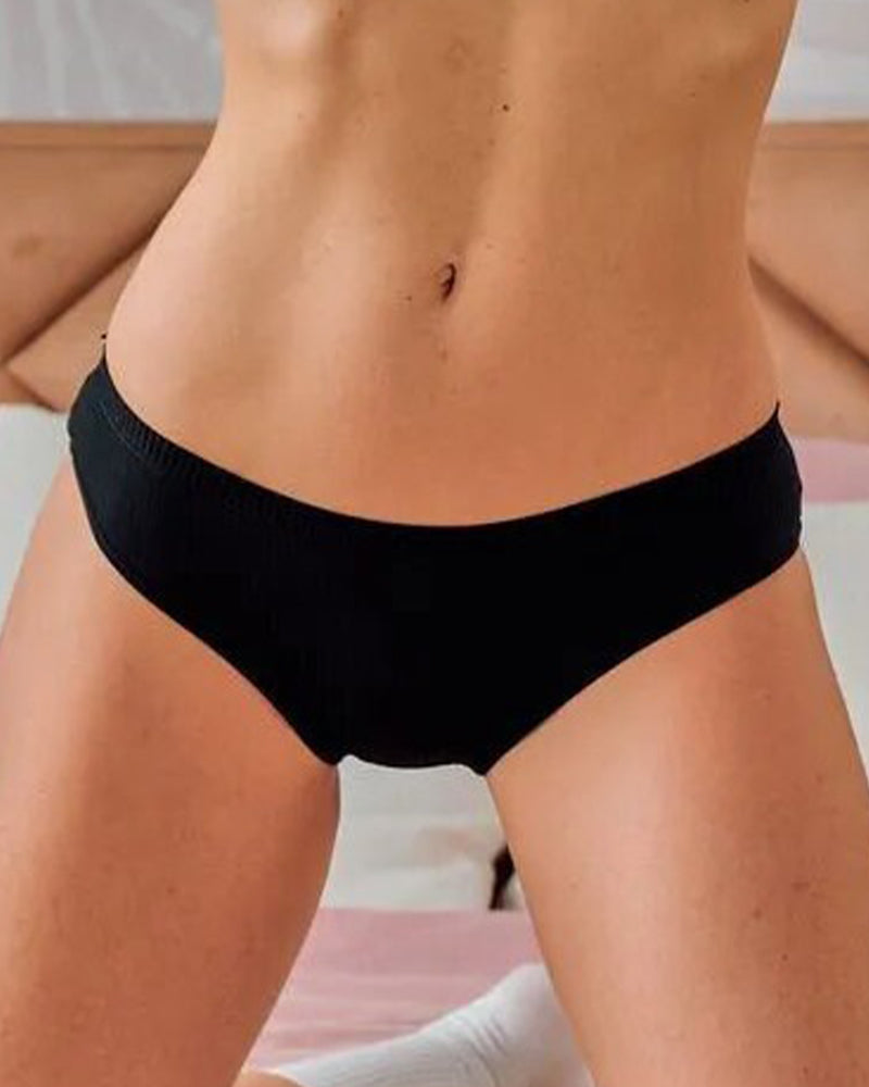 Black ribbed mid-rise waist panties made of cotton and spandex, seamless design.