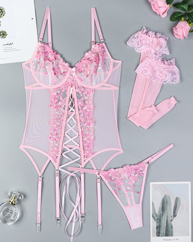 Pink floral embroidered lingerie set with garter and stockings. Sexy role play outfit.