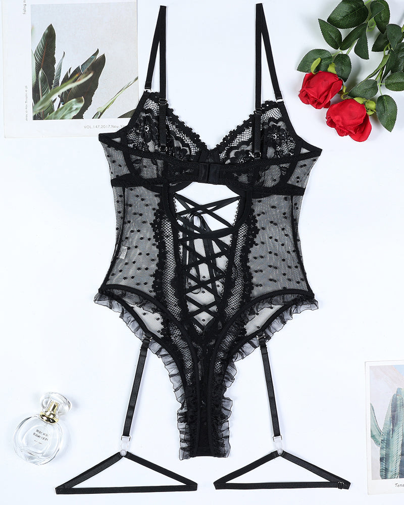 Black lace bodysuit with cross-strap design. Sexy lingerie, perfect for various occasions.
