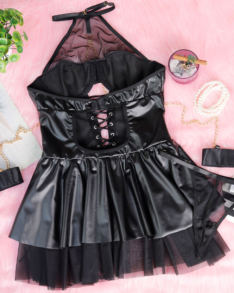 Black PU leather halterneck mini dress with mesh details, gold chain, and lace-up front