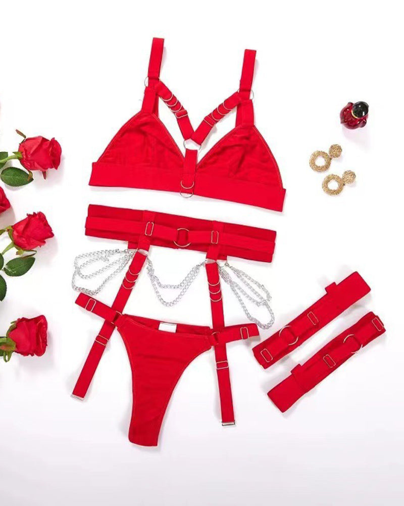 Red metal chain strap bra set with harness details. Sexy polyester lingerie.