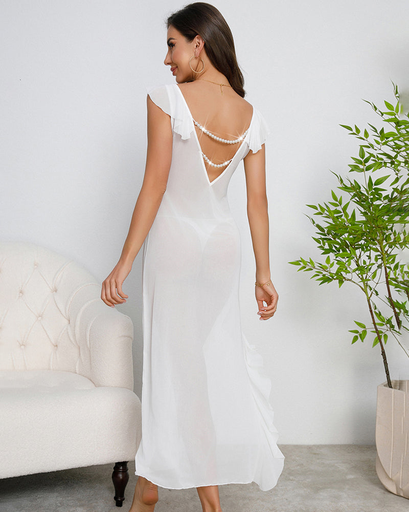White mesh sleep dress with pearl back, ruffled sleeves, and side slit. Perfect for leisure.