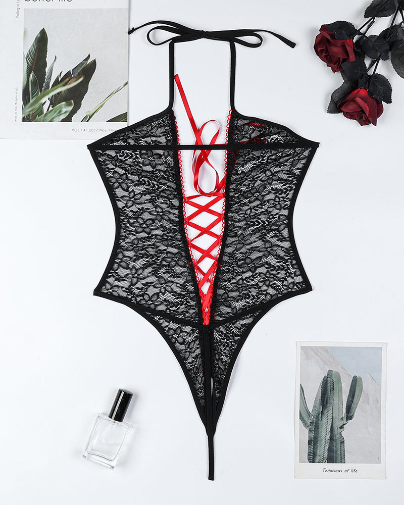 Crotchless black lace bodysuit with red ribbon detailing, sexy lingerie