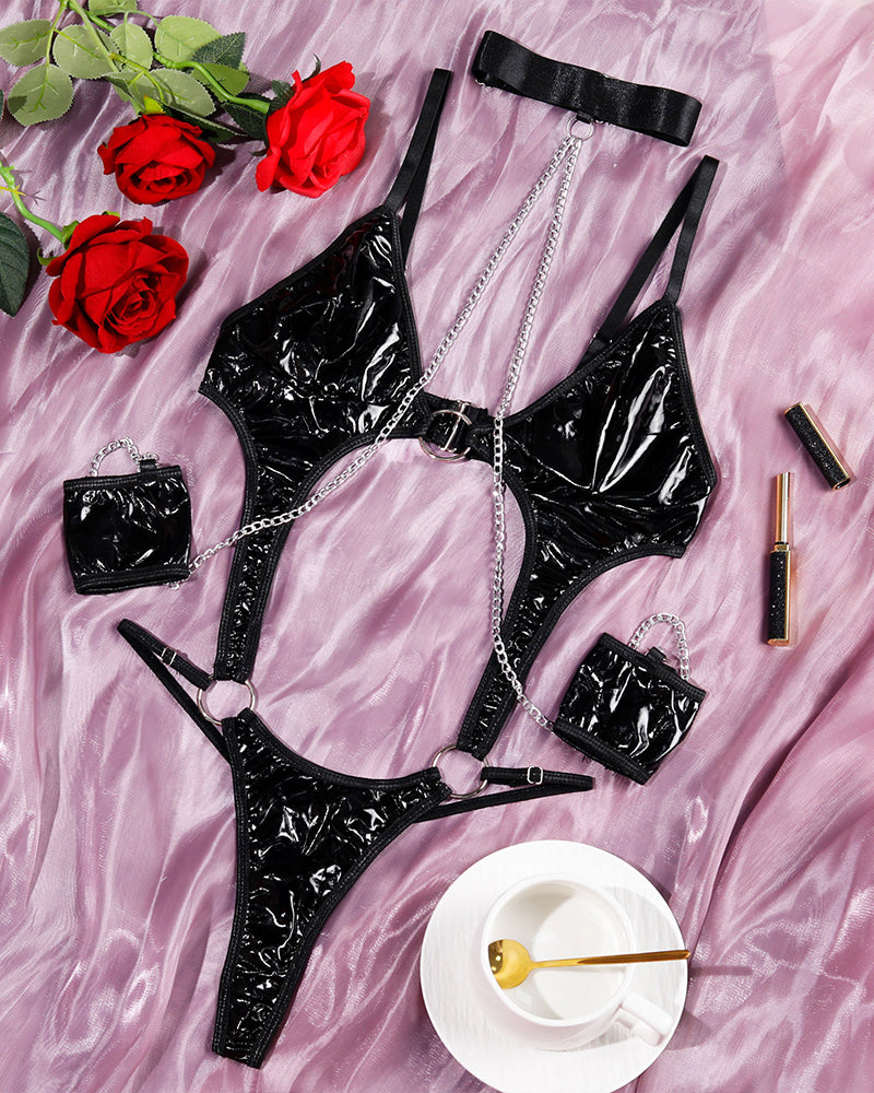 Black PU Hollow Chain Bodysuit with chain details. Sexy lingerie with cut-out design.
