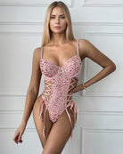 Pink sequin Mesh Erotic Butterfly Bodysuit with lace-up details and adjustable straps.