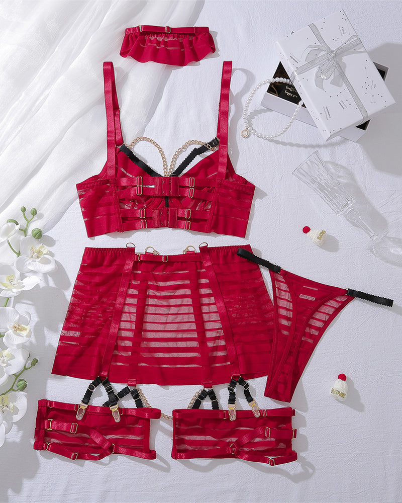 Red metal chain lingerie set: bra, skirt, g-string, and garter. Sexy lingerie for women.