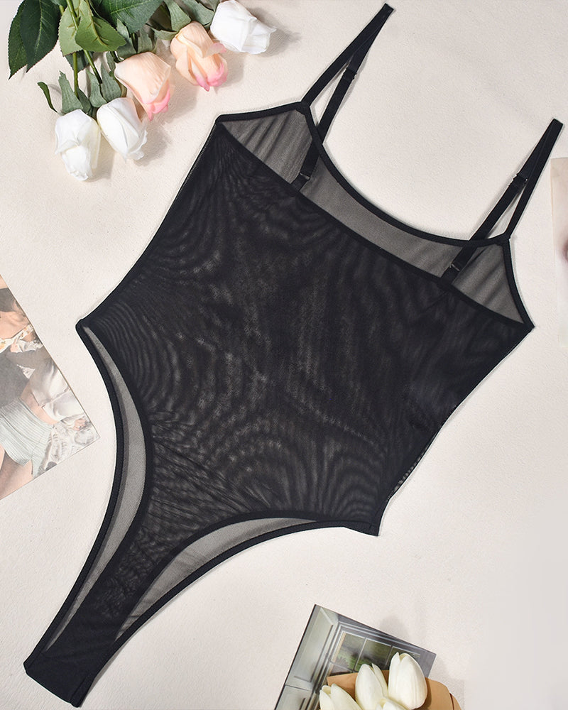 Black mesh bodysuit. Sheer, sexy lingerie with spaghetti straps. Ideal for date nights.