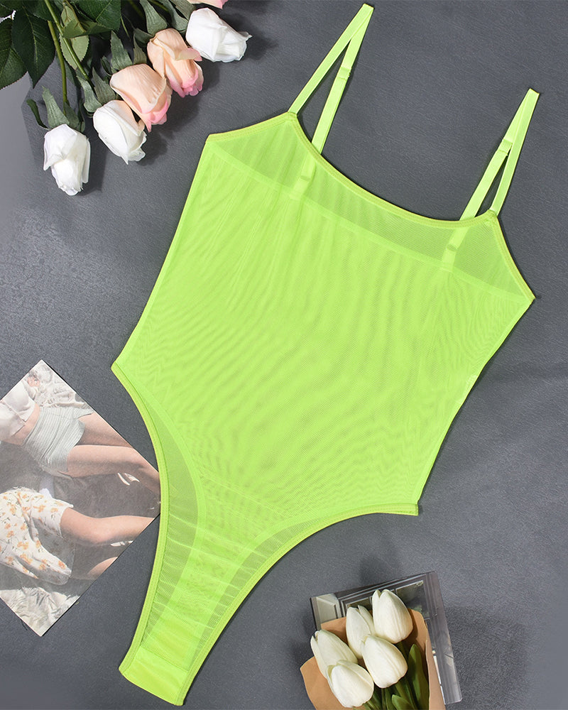 Neon green mesh bodysuit. High-cut, sexy lingerie. Perfect for date nights and special occasions.