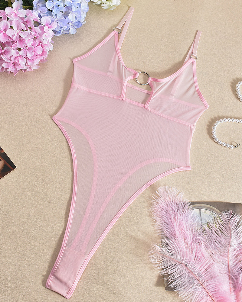 Pink mesh bodysuit with ring detail, perfect for date night. Flattering, comfortable, and alluring.