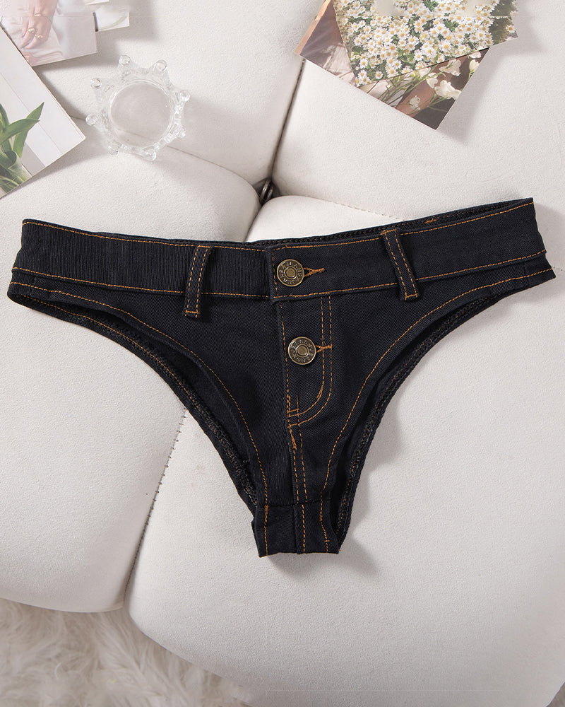 Denim thong low-rise panties in black, flat lay with two gold buttons