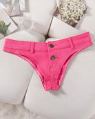 Denim thong low-rise panties in rose red, flat lay with button placket