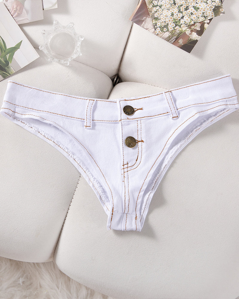 Denim thong low-rise panties in light blue, flat lay with two gold snaps