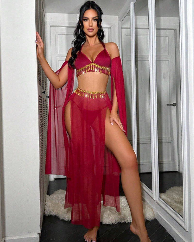 Red sheer halter bra with gold tassel chain, high-slit maxi skirt and arm sleeves