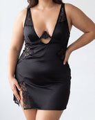 Black satin lace chemise slip dress with deep V neckline and lace panel detail