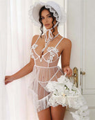 White floral lace babydoll lingerie with sheer mesh overlay and fringe-edged hem