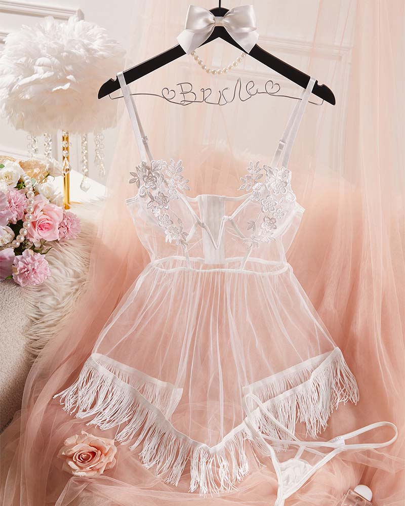 White floral lace babydoll lingerie on hanger with sheer mesh skirt and fringe hem