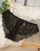 Black lace briefs with lace-up crisscross panel and scalloped edges