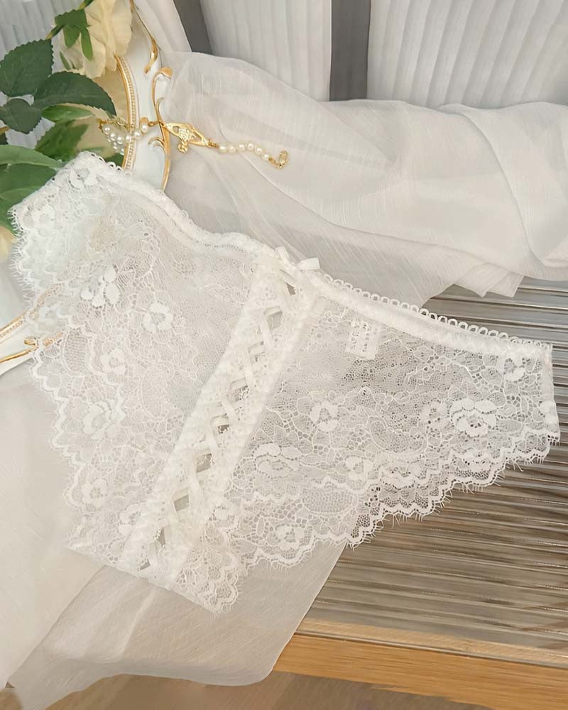 White lace panties with lace-up crisscross center panel and scalloped trim