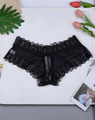 Black lace panties with scalloped trim and V-cut front sheer panel