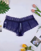 Navy blue lace thong-style panties with scalloped waistband and sheer front