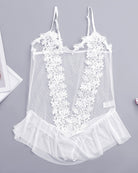 White sheer lace teddy with floral lace panels and ruffle hem, spaghetti straps