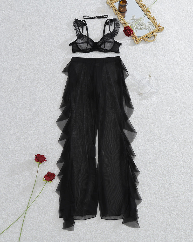 Black sheer lace bralette and mesh pants set with choker, flat lay