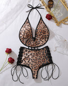 Leopard sequin halter bikini top and lace-up high-waist bottoms, flat lay