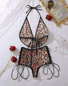 Leopard sequin halter bikini top with center bow and lace-up high-waist bottoms