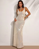 Beige sequin crochet maxi dress with spaghetti straps and star appliques, sheer knit
