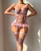 Pink floral corset top with garters and fishnet stockings, tulle ruffle hem