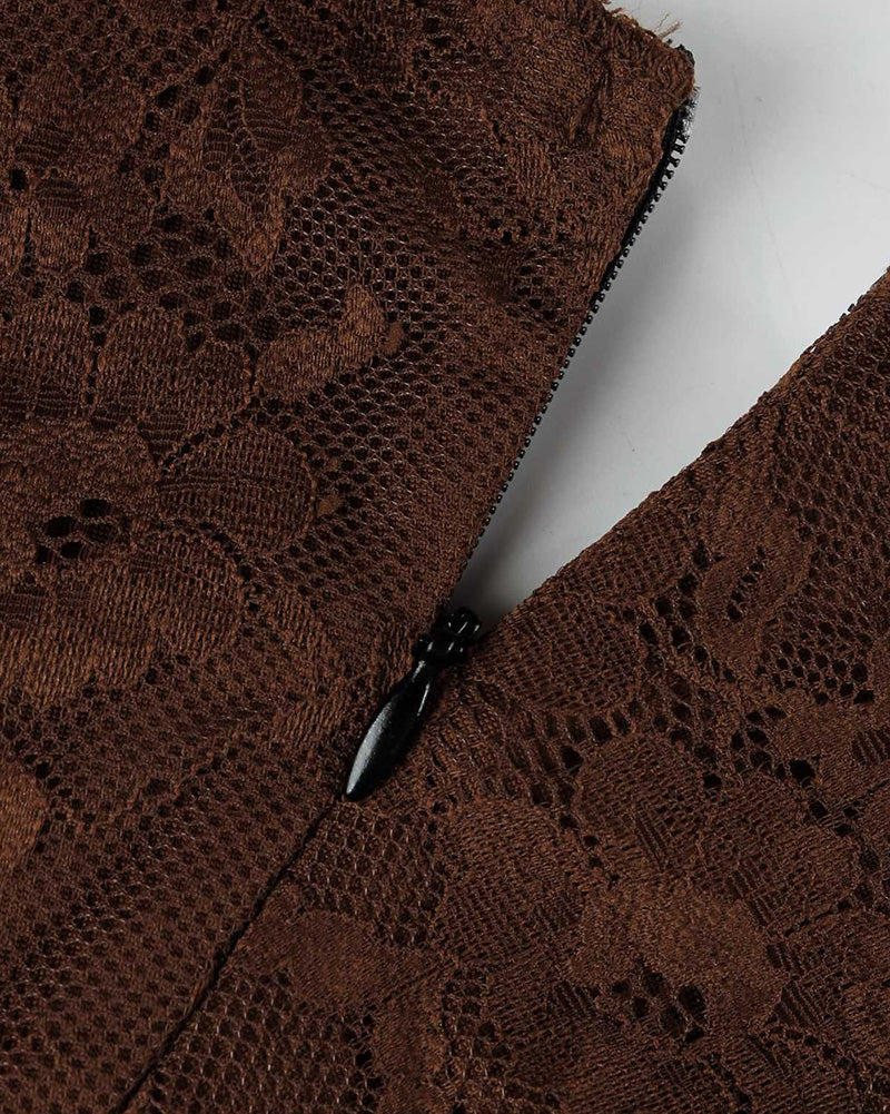 Brown lace bodysuit fabric close-up with black-trim seam detail