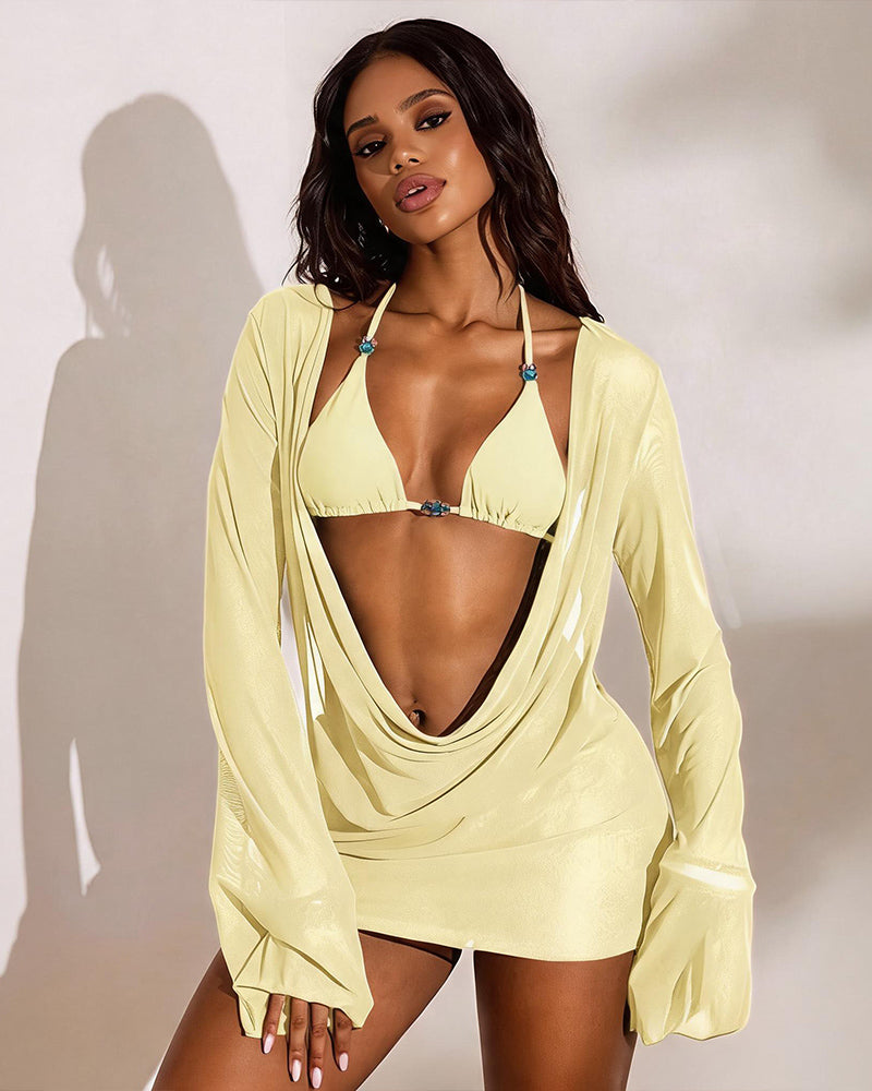 Yellow sheer long-sleeve draped cover-up over triangle bikini top and tie-side bottoms.