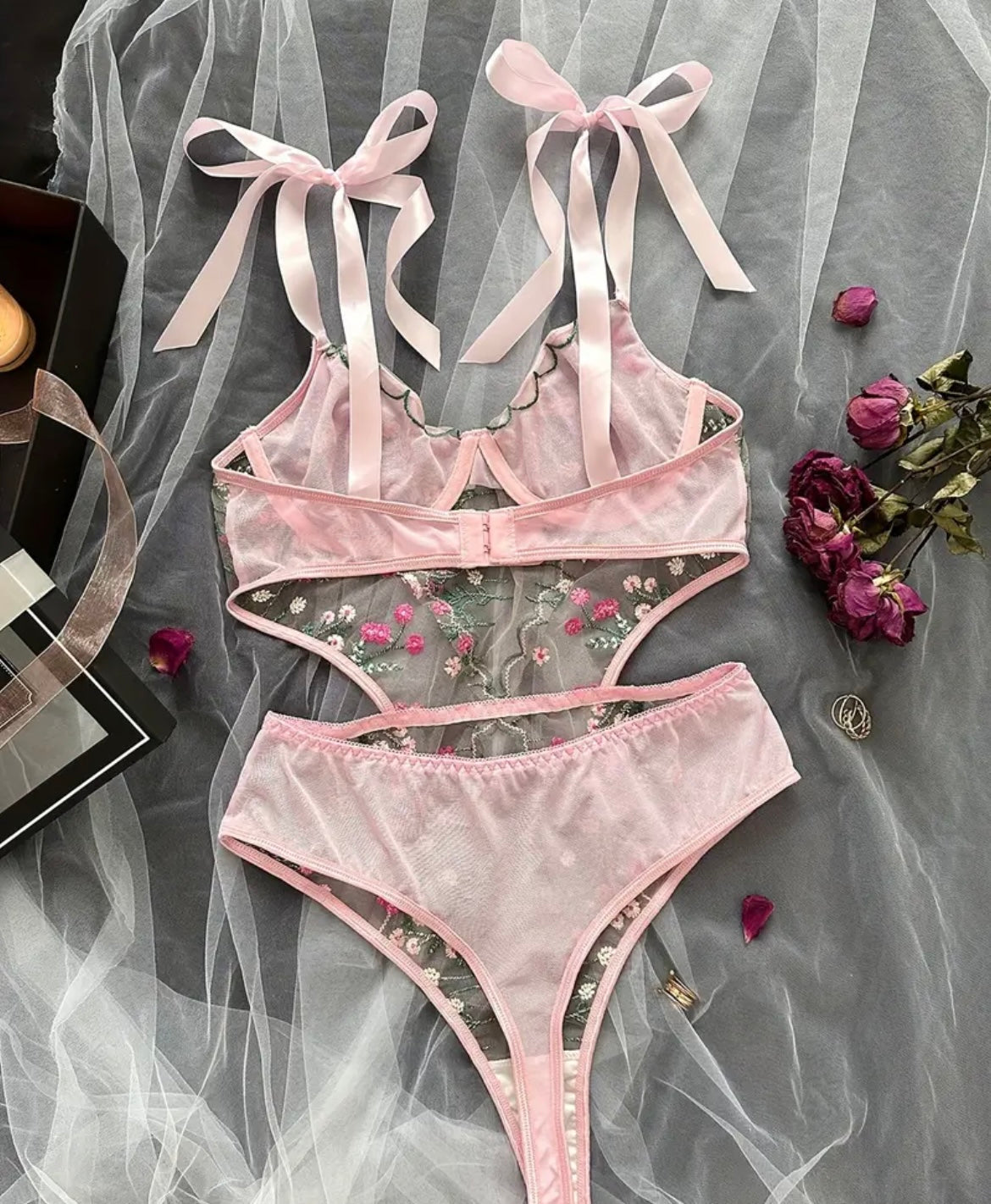 Pink floral embroidered sheer bodysuit with bow straps and high-cut panty