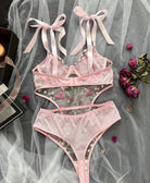 Pink floral embroidered sheer bodysuit with bow straps and high-cut panty