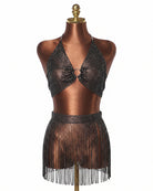 Black rhinestone halter crop top with O-ring and matching fringe mini skirt on mannequin