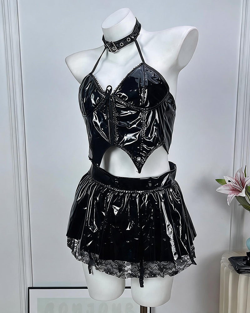 Black patent halter crop top and mini skirt with choker, shown on mannequin torso